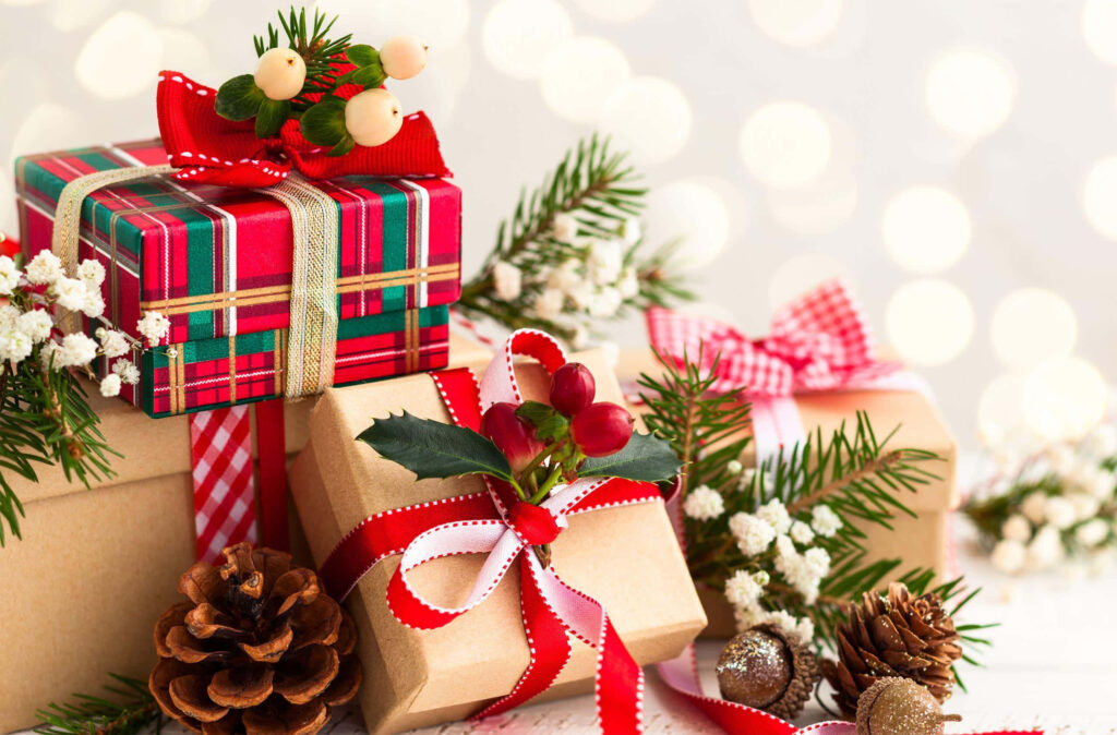Cozy Holiday Background with Wrapped Gifts and Festive Decor Wallpaper