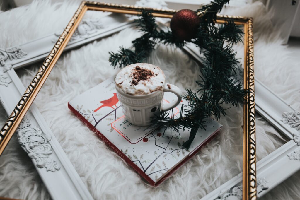 Festive Coffee Delight: Whipped Cream & Wreath Wallpaper Background