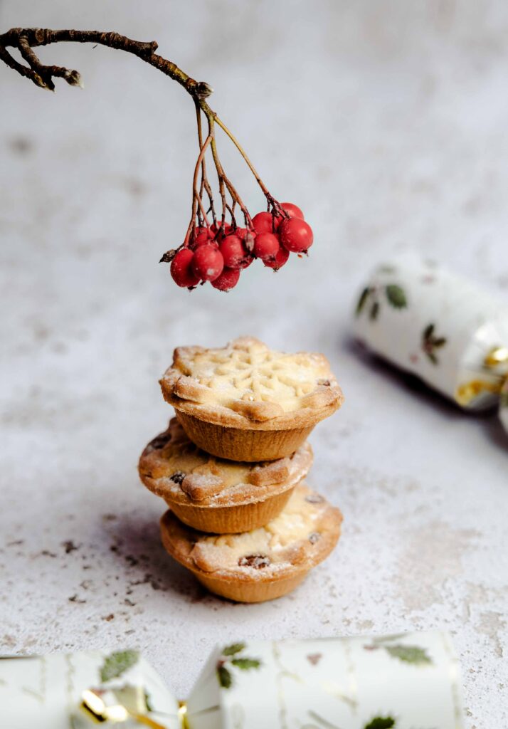 Festive Cookie Stack with Berries: Cozy Dessert Wallpaper Background