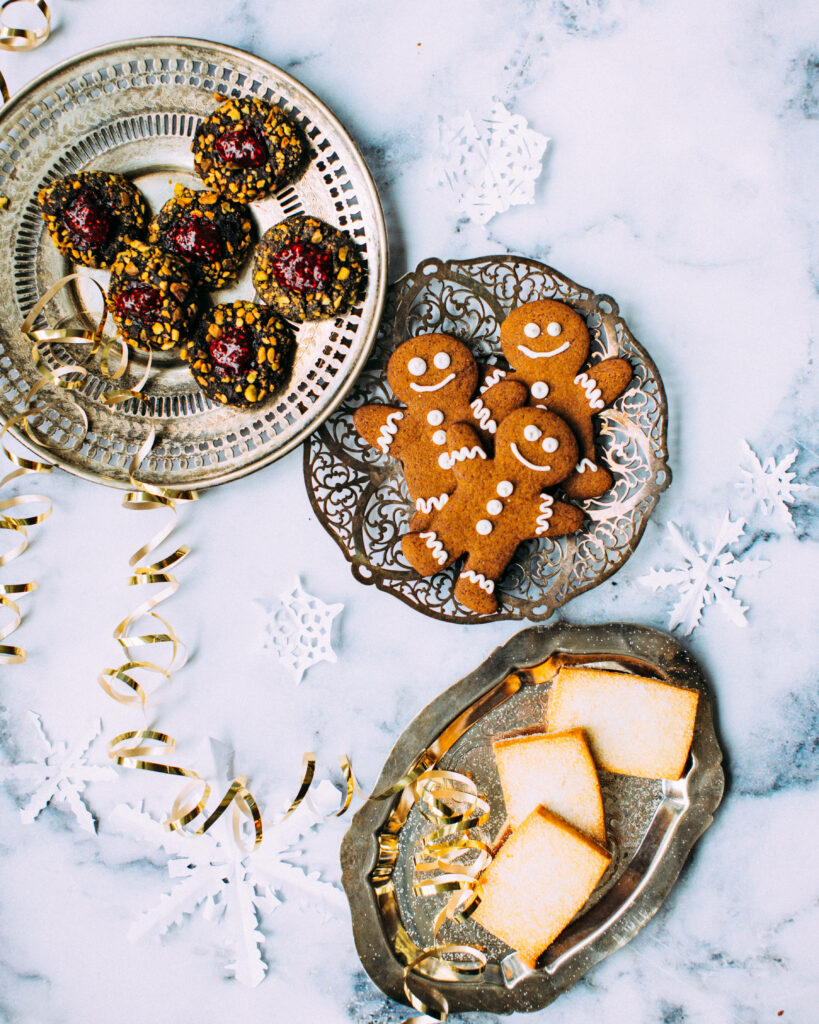 Festive Delights: A Photogenic Gingerbread Man Accentuating Holiday Baking Spirit Wallpaper