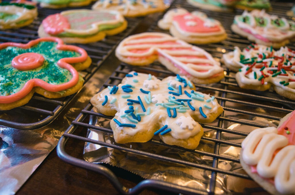 Sprinkled Delights: Festive Christmas Cookies on Baking Tray Wallpaper