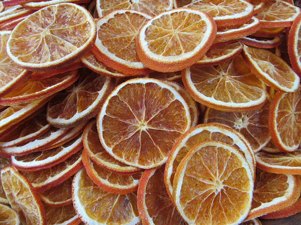 Festive Dried Orange Wallpaper: Warm, Vibrant Snack Decor Background