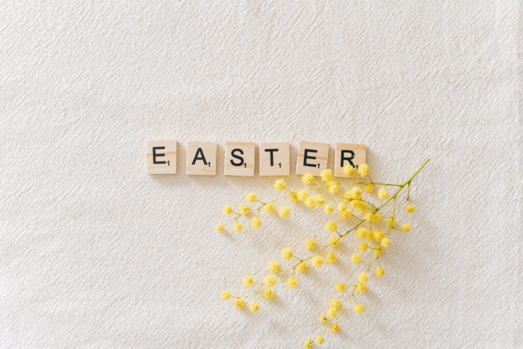 Easter Scrabble Wallpaper with Yellow Flowers on Textured Background