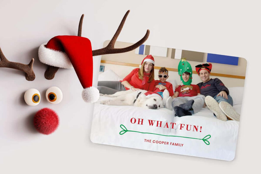 Festive Family Christmas Card: Holiday Fun with Joyful Pets Wallpaper
