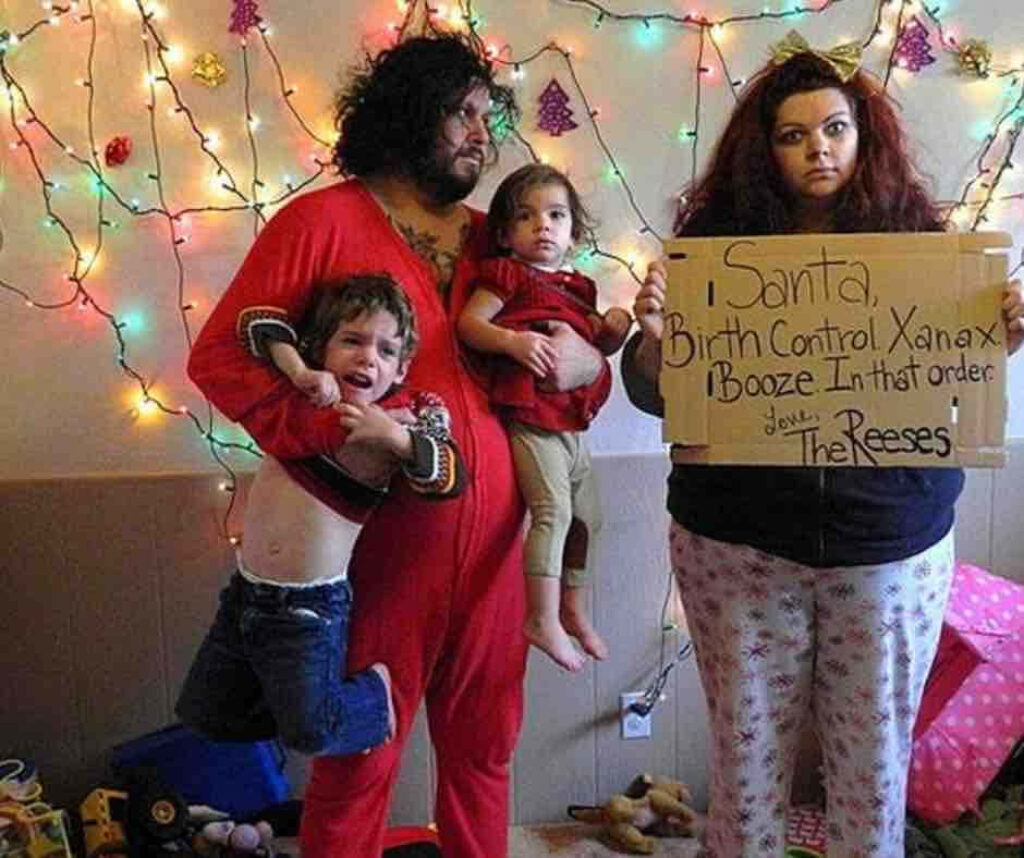 Festive Family Fun: Humorous Christmas Photo with Holiday Lights Wallpaper