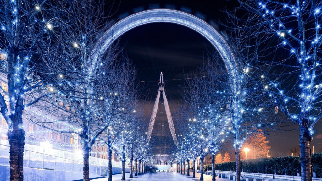 Ferris Wheel Illumination Amidst Winter's Embrace - Enchanting Desktop Backdrop Wallpaper