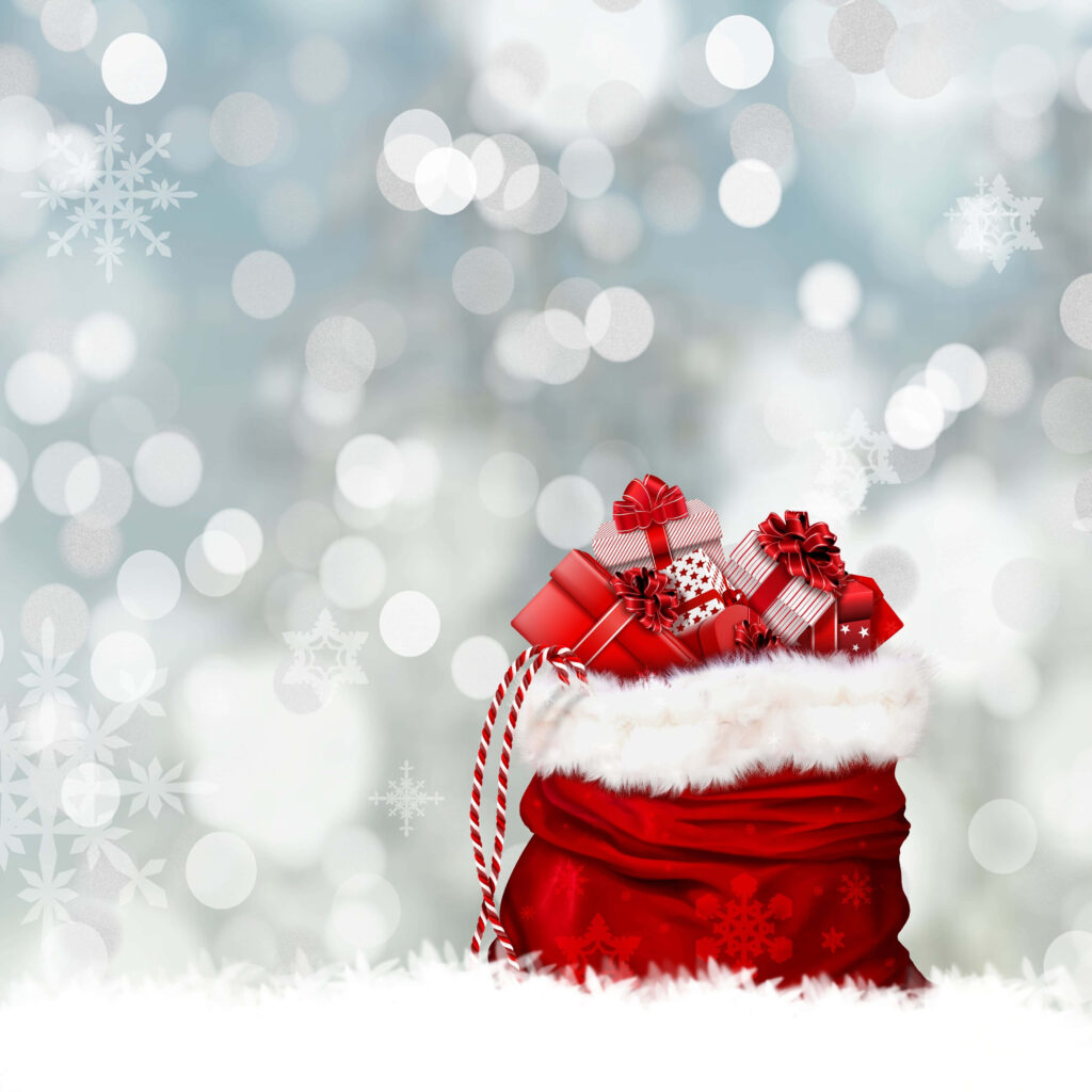 Festive gift box with red ribbon in plush sack surrounded by holiday presents and winter decor Wallpaper