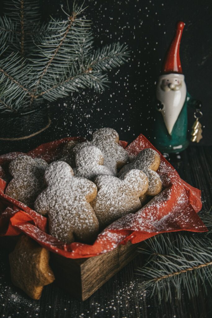 Festive Wallpaper: Gingerbread Cookies with Holiday Cheer & Pine