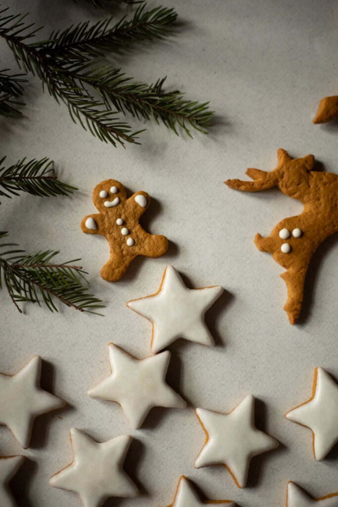 Festive Gingerbread Cookies & Evergreen Holiday Background Wallpaper