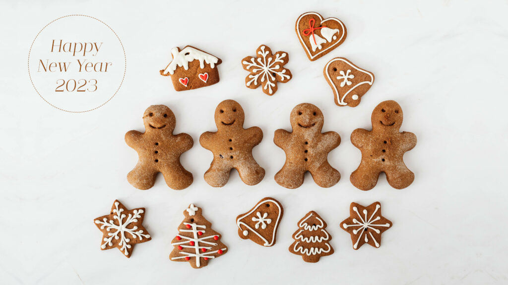 Festive New Year 2023 Wallpaper with Decorated Gingerbread Cookies