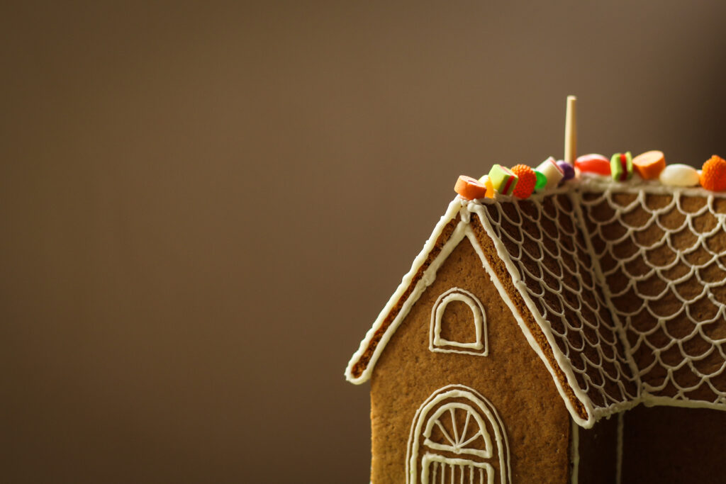 Colorful Gingerbread House Wallpaper: Festive Christmas Decor