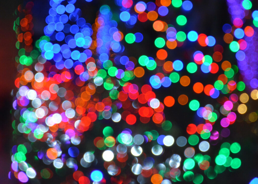 Festive Brilliance: Captivating Bokeh Background, a Burst of Colors Wallpaper