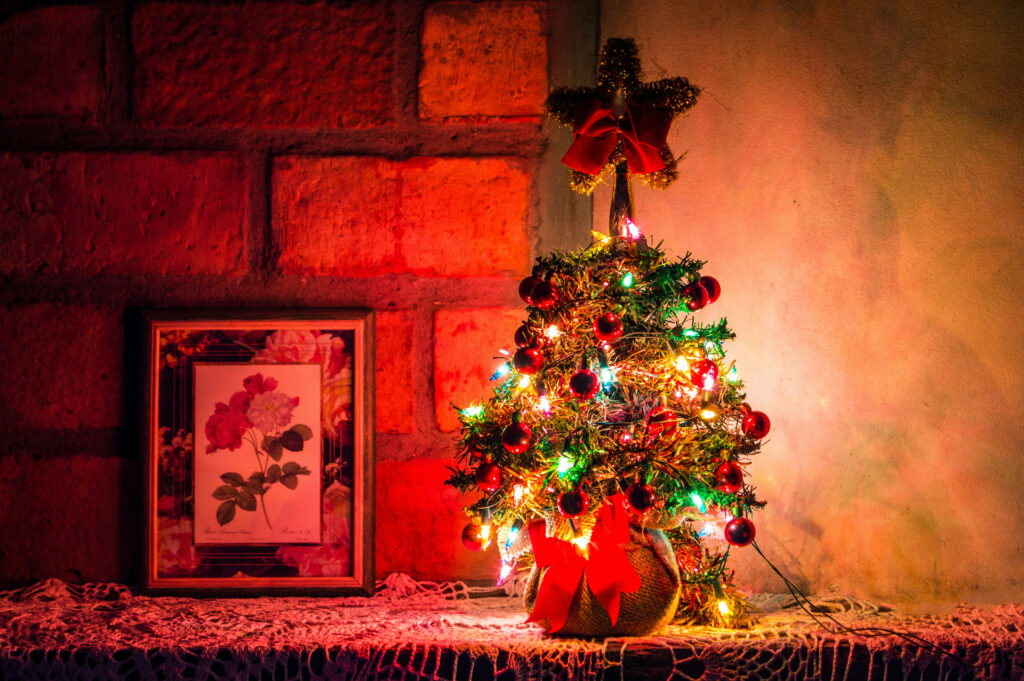 Festive Illumination: Joyful Mini Tree in High-Definition Wallpaper