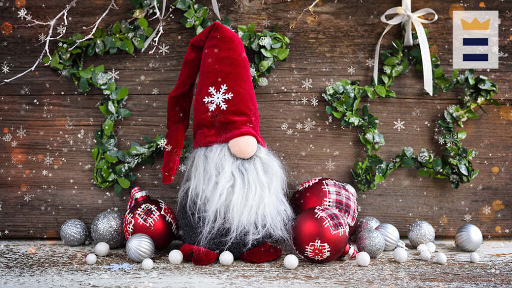 Cheerful Gnome Wallpaper: Festive Red Hat & Ornaments on Wood Backdrop