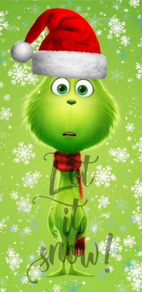 Festive Grinch in Santa hat and scarf on lime green snowy backdrop with Let it snow text Wallpaper