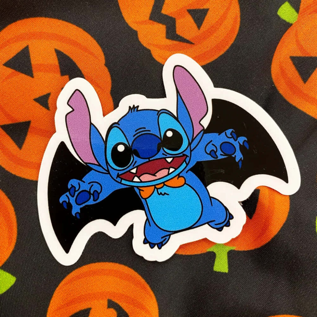 Stitch Bat Halloween Wallpaper with Cheerful Pumpkins