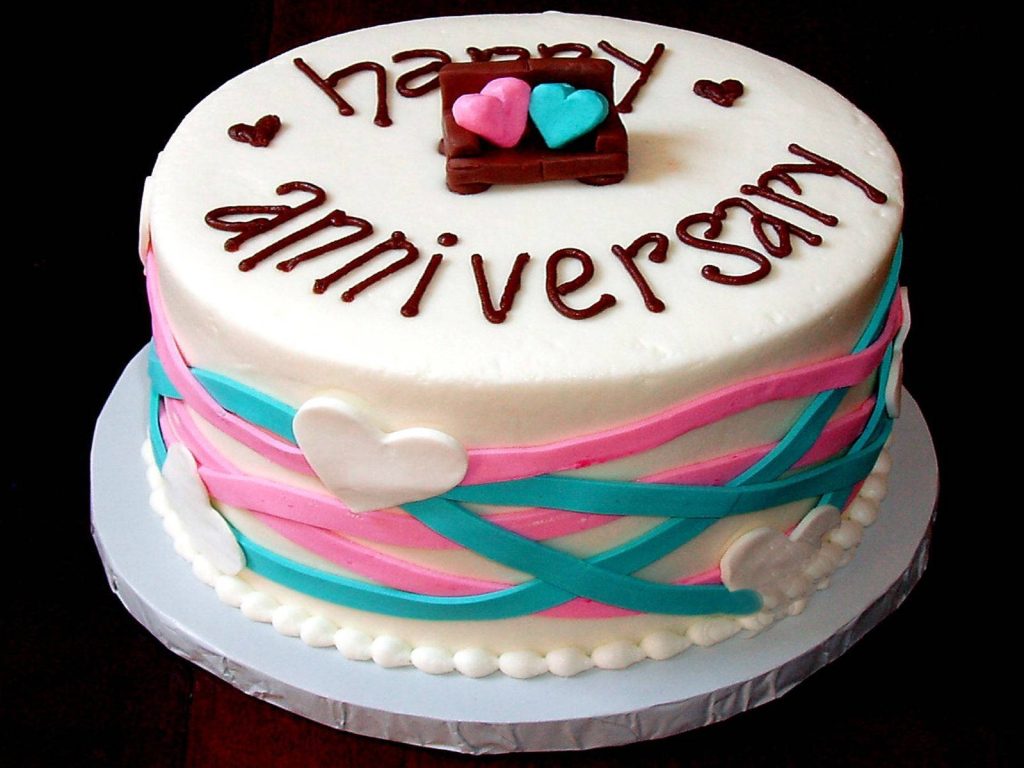 Happy Anniversary cake wallpaper white frosting pink turquoise ribbon icing fondant hearts sofa topper