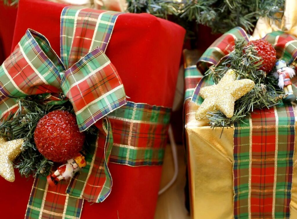 Festive Holiday Gifts with Plaid Ribbons & Christmas Magic Background Wallpaper
