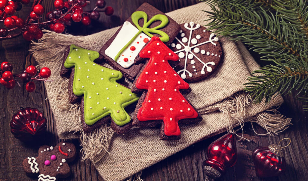 Festive Gingerbread Tree Wallpaper: Cozy Holiday Decor Background