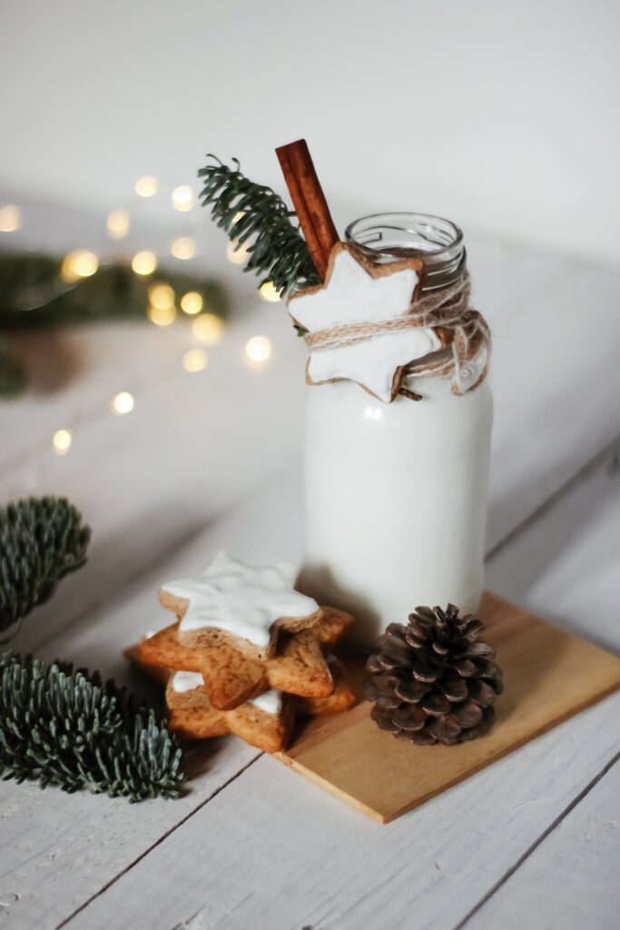 Festive Holiday Wallpaper: Star Cookies, Milk, Pine Cone & Lights