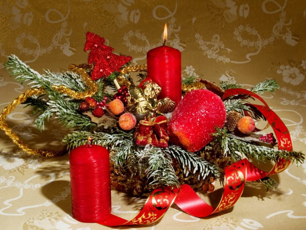 Festive Wallpaper: Lush Fur-Tree Branches & Red Candle Centerpiece