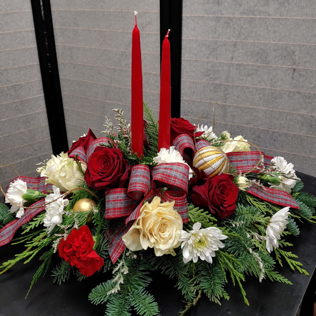 Elegant floral holiday wallpaper with red white roses plaid ribbon evergreen and red candles