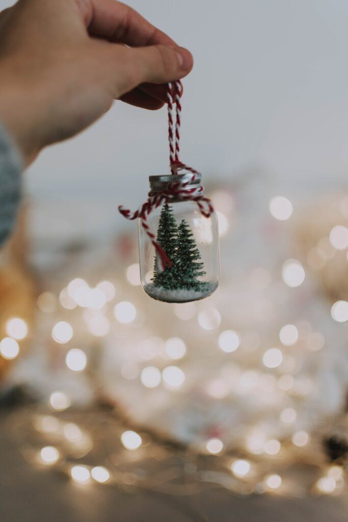 Cozy Christmas Jar Wallpaper with Mini Tree & Sparkling Lights