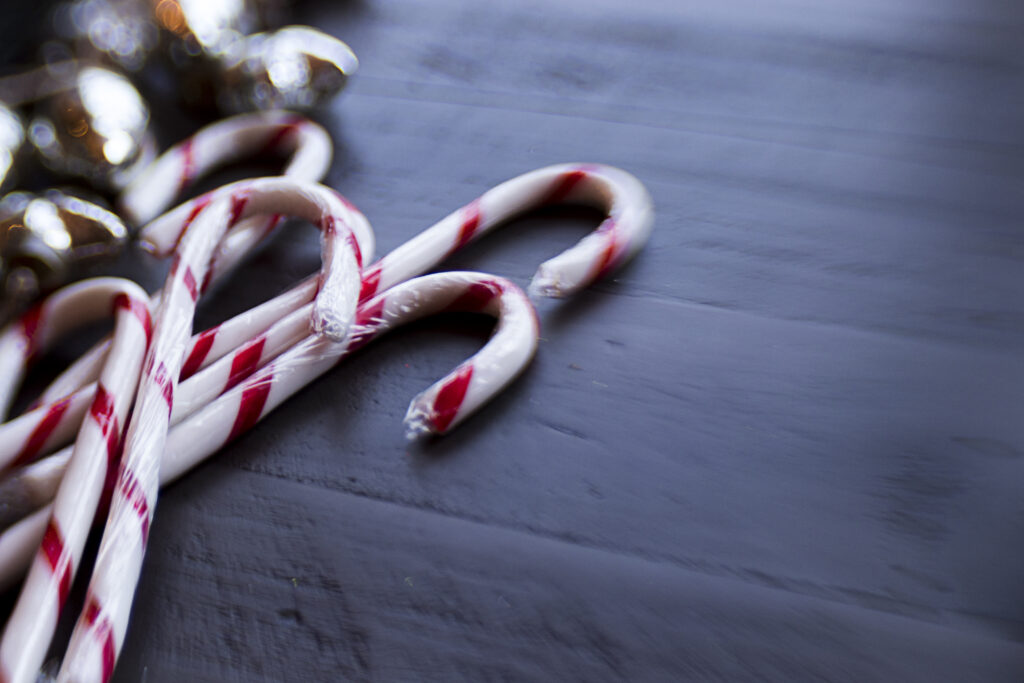 Festive Candy Cane Macro Wallpaper for a Cheerful Christmas Vibe