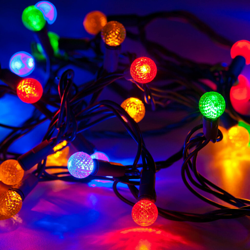 Vibrant Multicolored Christmas Lights for a Festive Holiday Atmosphere Wallpaper