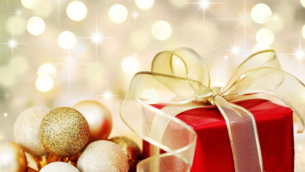 Festive Red Gift Box Wallpaper with Golden Ornaments & Twinkling Lights