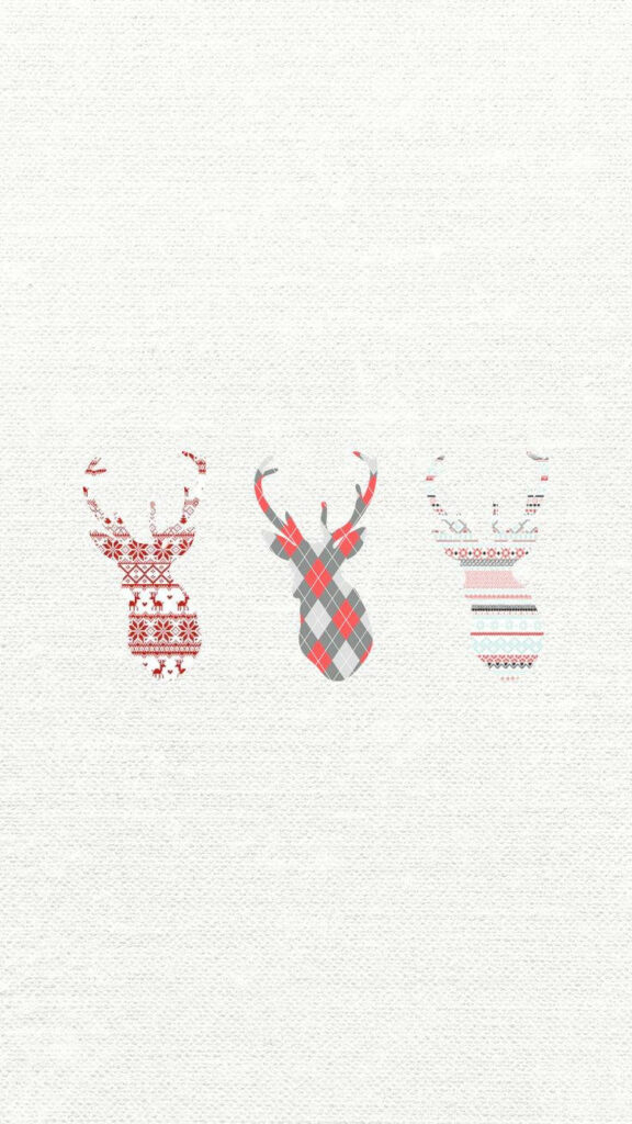 Whimsical Reindeer Trio: Festive Patterns in a Christmas iPhone Wallpaper