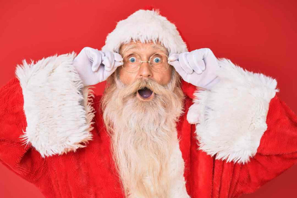 Festive Santa Claus Wallpaper: Cheerful Holiday Background for Gatherings
