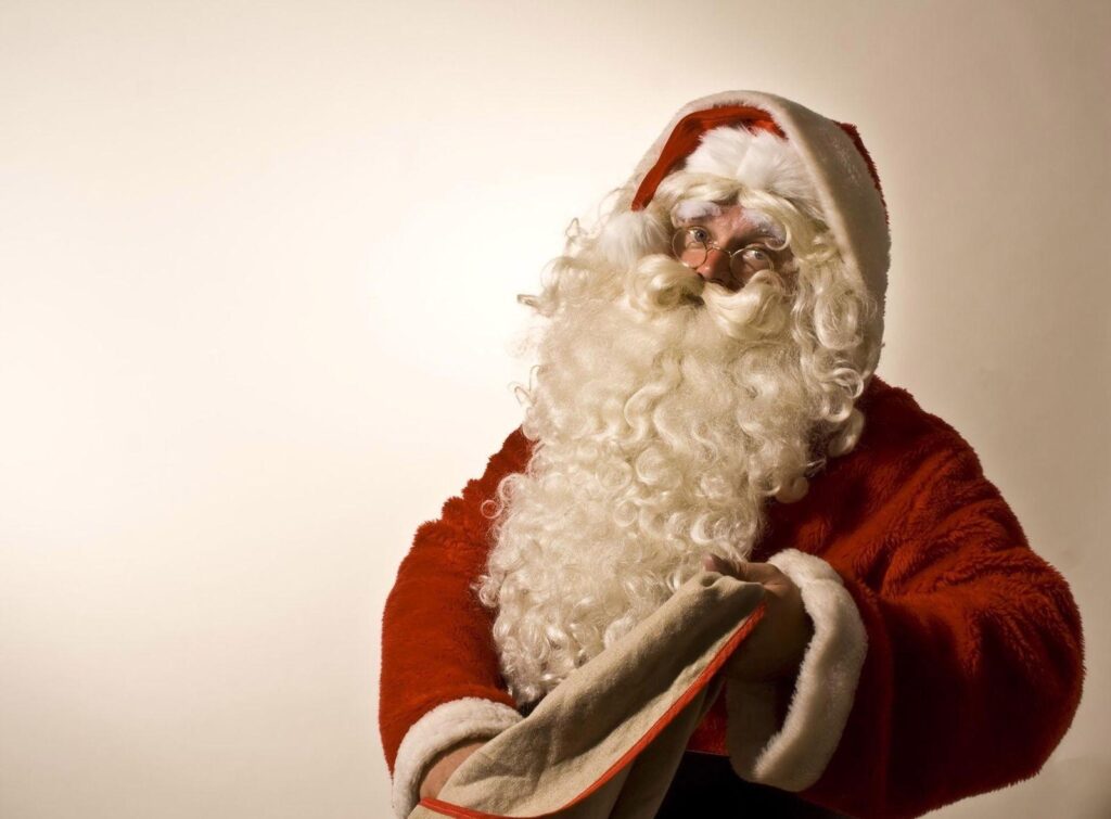 Festive Santa Claus Wallpaper for Joyful Christmas Celebrations