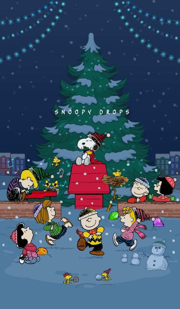 Festive Snoopy Wallpaper: Peanuts Gang Celebrating Christmas Joy