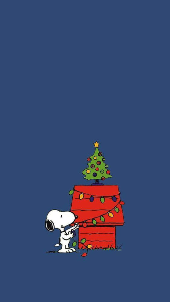 Festive Snoopy Wallpaper: Christmas Lights & Tree on Blue Background