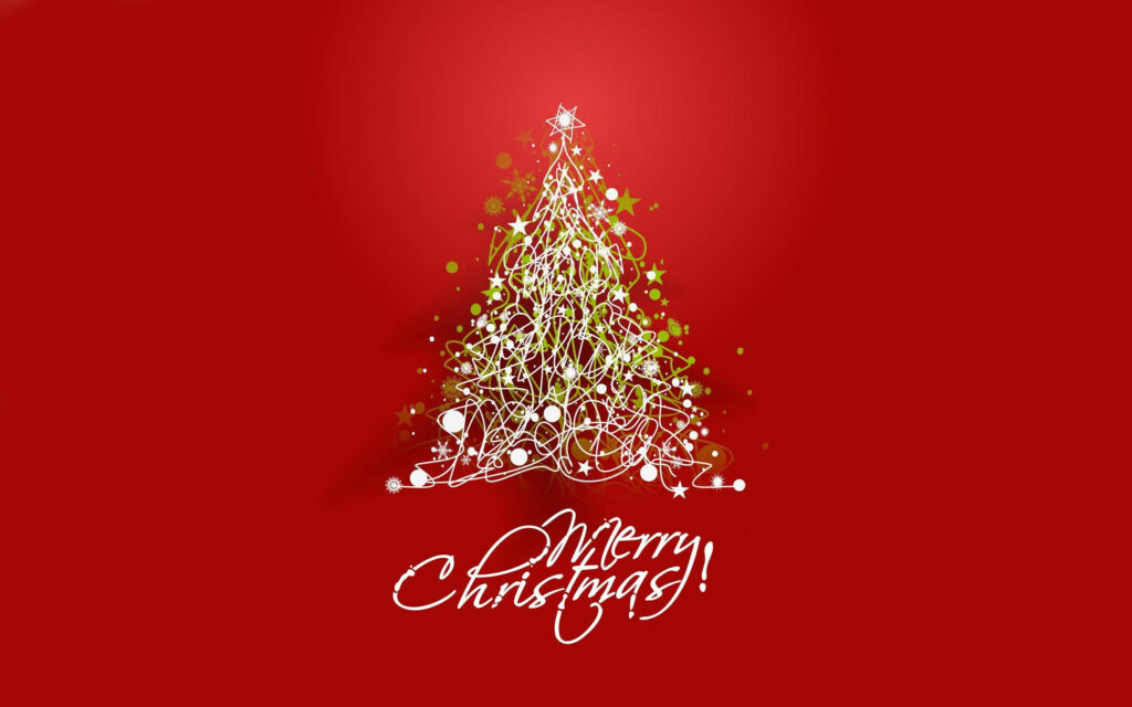 Festive Delight: A Stunning Christmas Tree Embraced by White Merry Christmas Greetings on a Vibrant Red Background Wallpaper