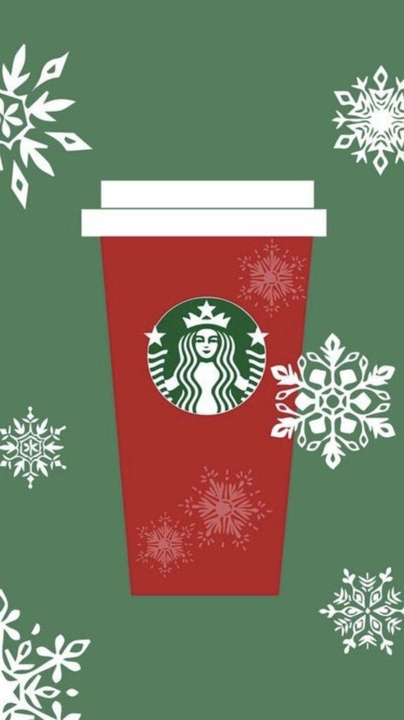 Starbucks holiday red cup on green background with white snowflakes cozy festive wallpaper