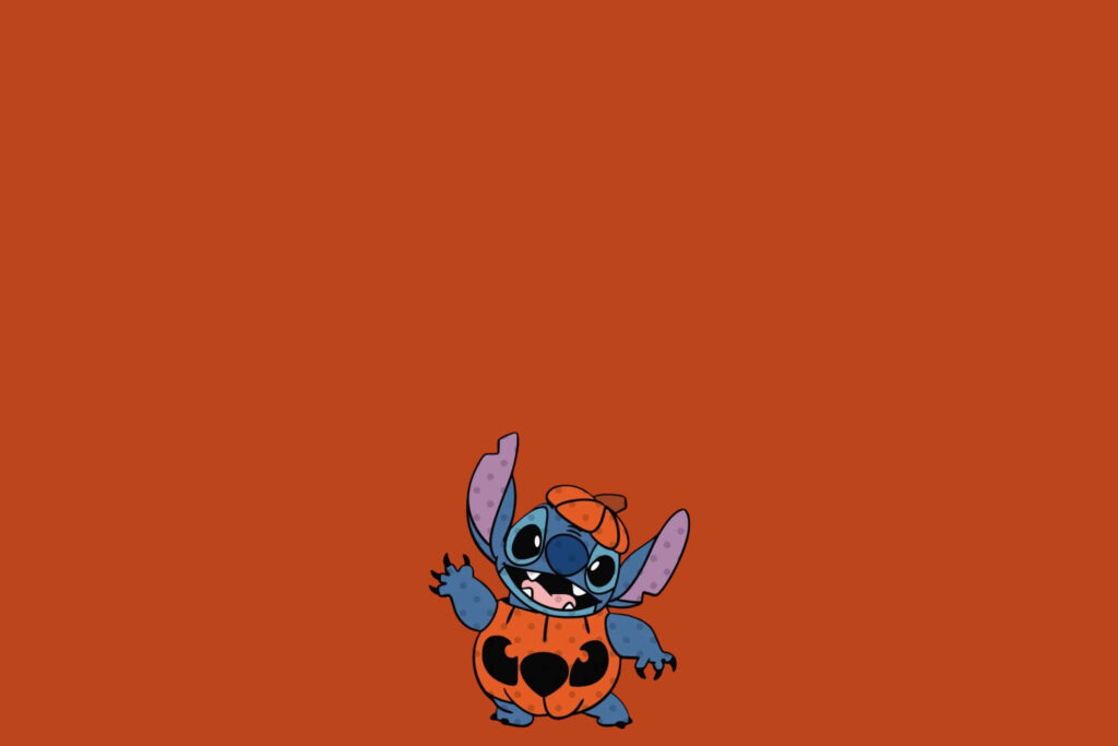 Festive Stitch Pumpkin Wallpaper: Whimsical Thanksgiving Background