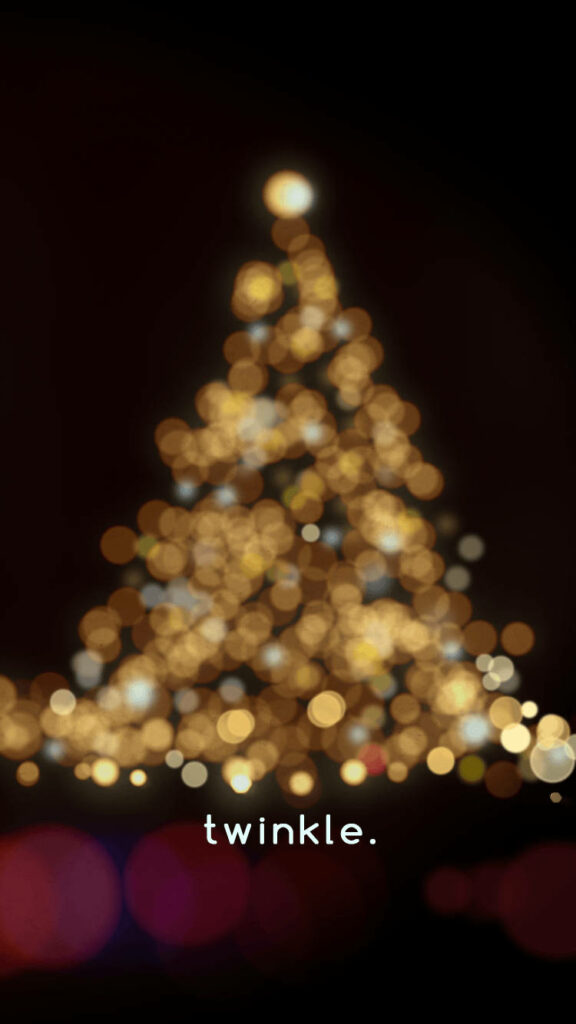 Twinkling Christmas Tree Wallpaper: Festive Magic in Dark Background