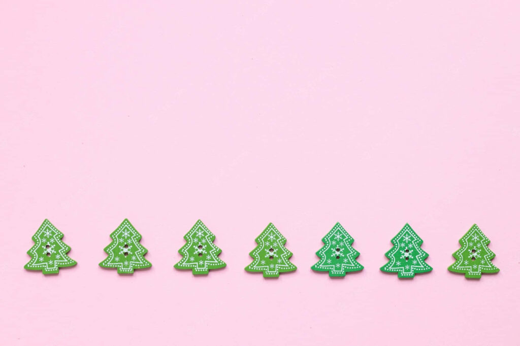 Charming Green Christmas Tree Cookies on Pink Festive Wallpaper
