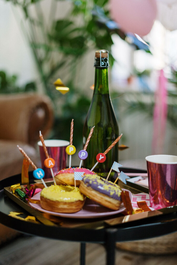 Festive Doughnuts and Decorations for a Cheerful Celebration Wallpaper