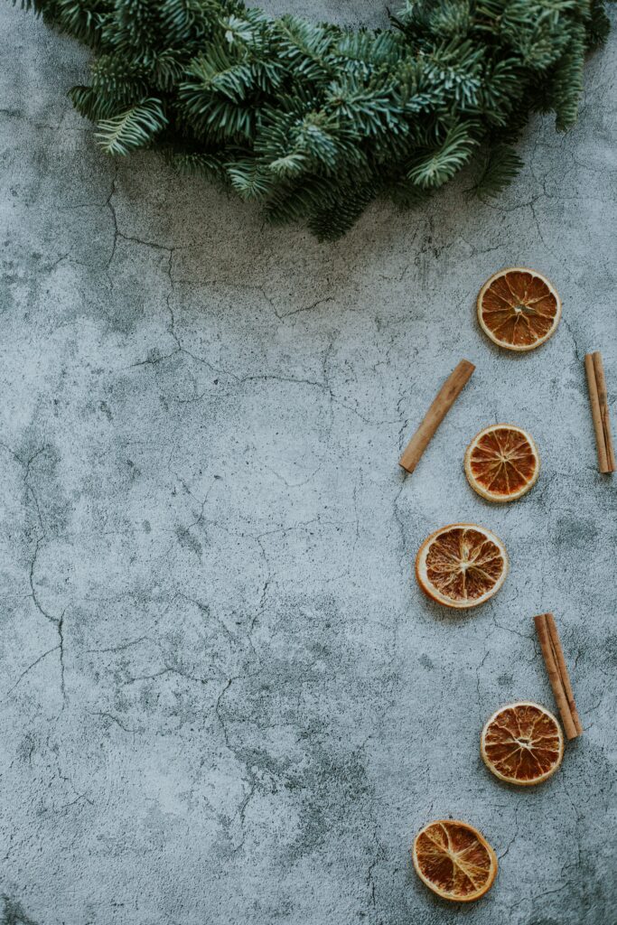 Festive Dried Orange Slices & Cinnamon Sticks Wallpaper Background