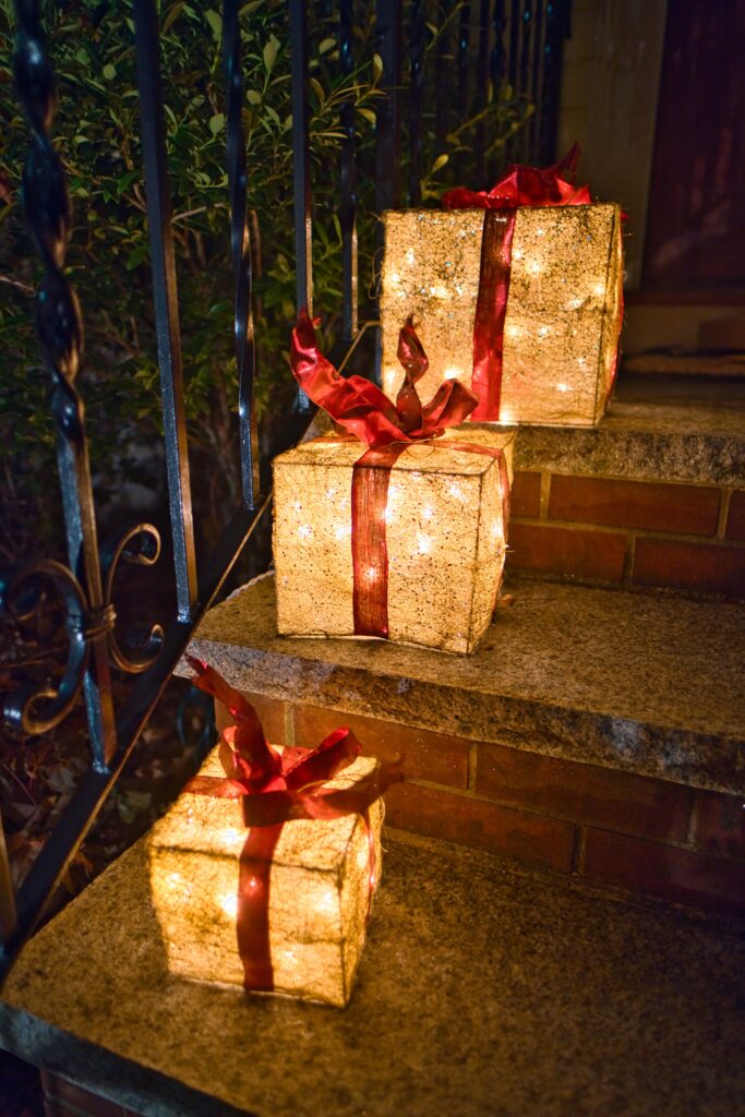 Cozy Holiday Wallpaper: Glowing Gift Boxes & Warm Lights