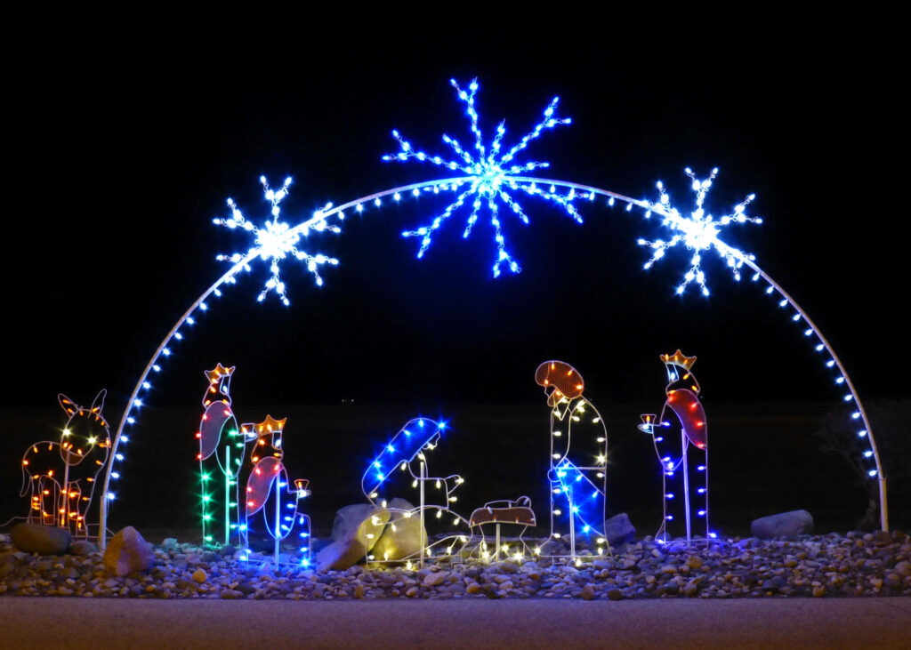 Illuminated Nativity Scene Wallpaper with Starry Background