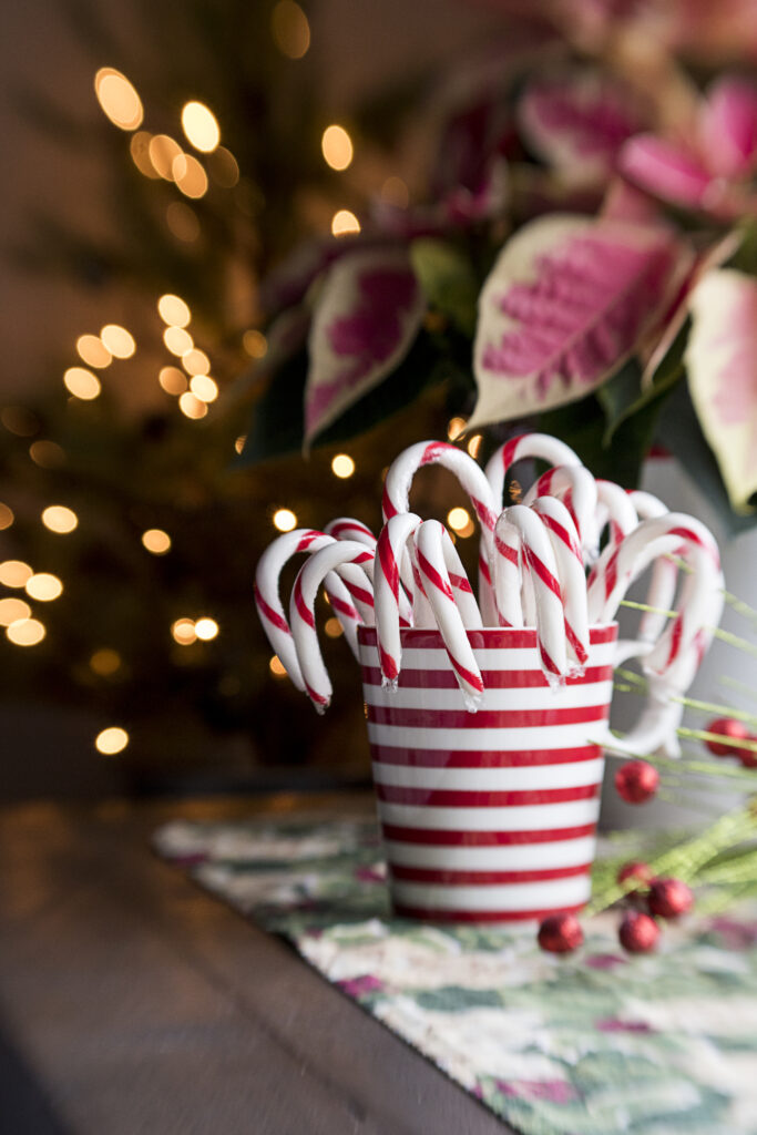 Festive Wallpaper: Candy Cane Cup, Holiday Lights & Poinsettias
