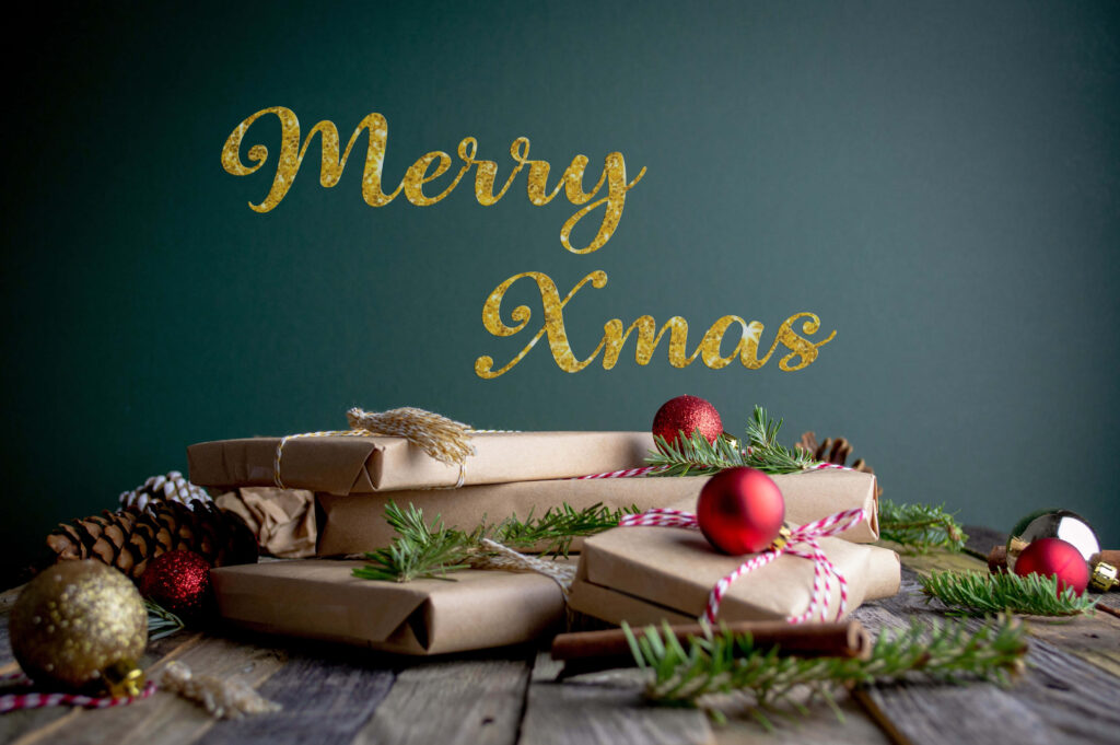 Festive Christmas Wallpaper with Wrapped Gifts and Greenery