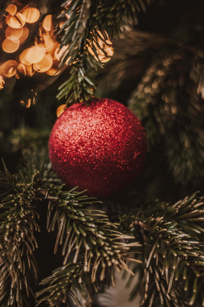 Festive Wallpaper: Red Ornament & Green Pine for Holiday Cheer