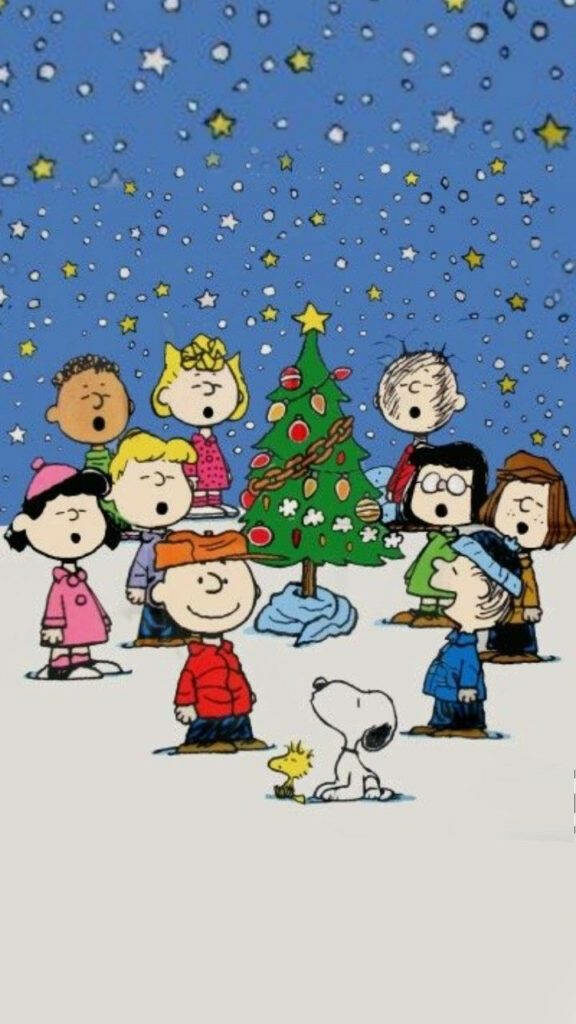 Festive iPhone Wallpaper: Snoopy & Friends by Christmas Tree