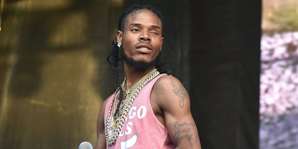 Fetty Wap concert wallpaper sharp image pink tank top gold chains tattoos intense stage presence