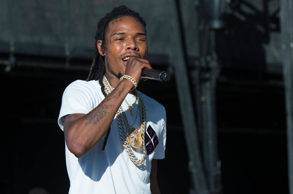 Fetty Wap performing live hip-hop concert with gold chains white tee high contrast lighting wallpaper